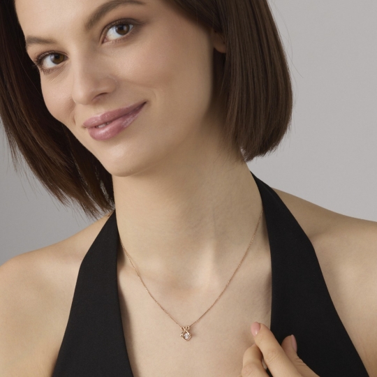 Подвеска из белого золота с бриллиантами и сапфиром