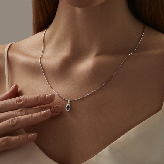 Серьги из белого золота с бриллиантами и сапфирами