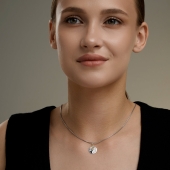 Подвеска из серебра с позолотой и фианитом 