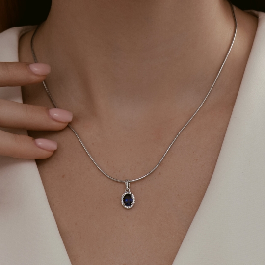 Кольцо из серебра с сапфировым корундом и фианитами