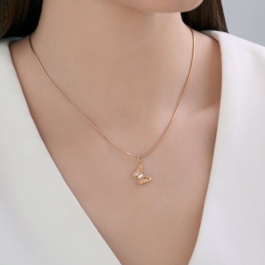 Подвеска из золота с родолитом и фианитами "Колибри"