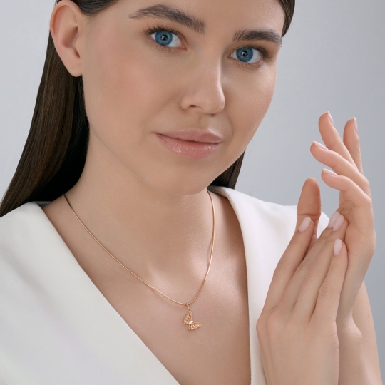 Подвеска из золота с родолитом и фианитами "Колибри"