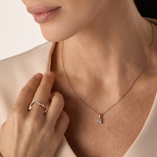 Подвеска из золота с сапфировым корундом и фианитами