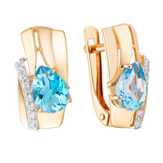 Кольцо из золота с топазом Swiss и фианитами