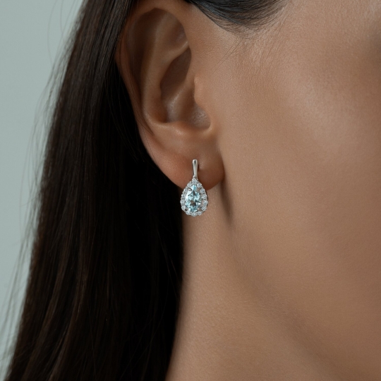 Кольцо из серебра с топазом и фианитами