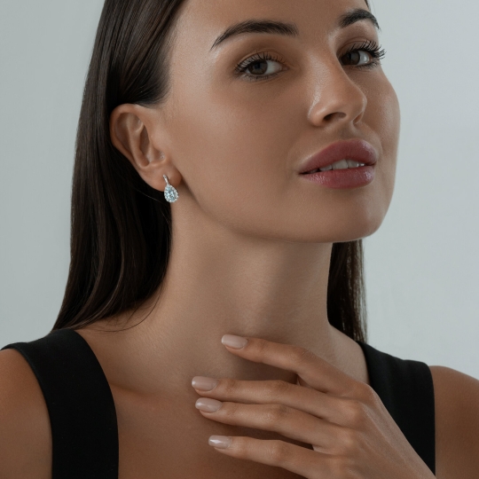 Кольцо из серебра с топазом и фианитами