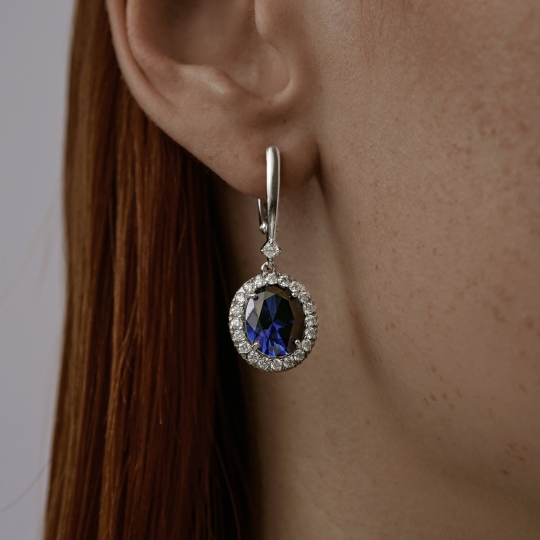 Серьги из серебра с топазами и хризолитами