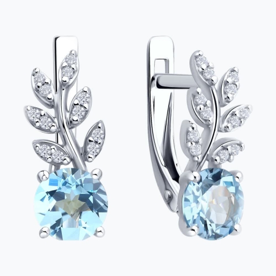 Кольцо из серебра с топазом и фианитами