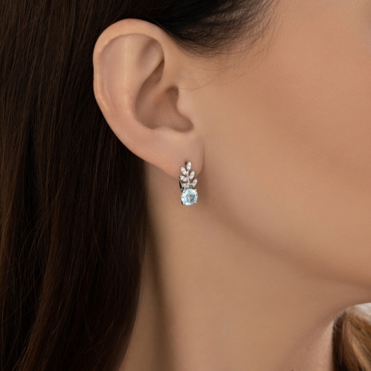 Кольцо из серебра с топазом и фианитами