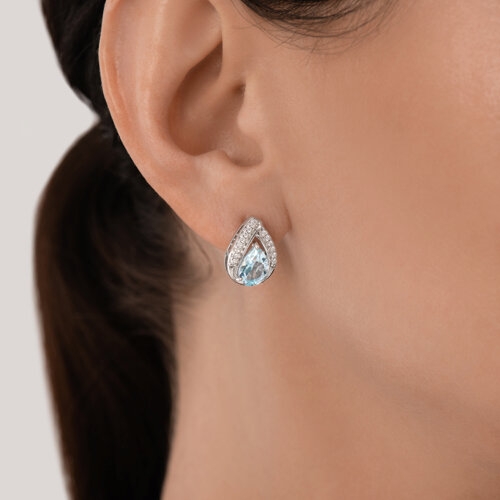 Кольцо из серебра с топазом и фианитами