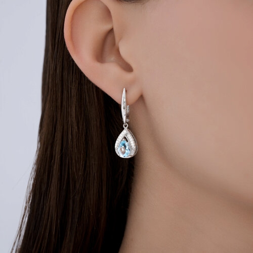 Кольцо из серебра с топазом и фианитами