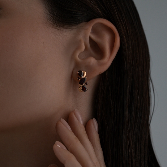 Кольцо из серебра с позолотой и гранатами