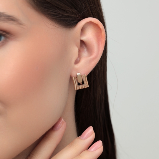 Серьги из золота с бриллиантами и изумрудами