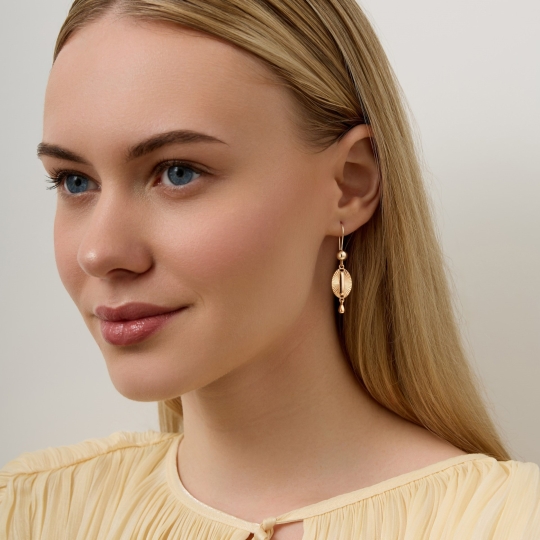 Серьги из комбинированного золота с "танцующими" бриллиантами