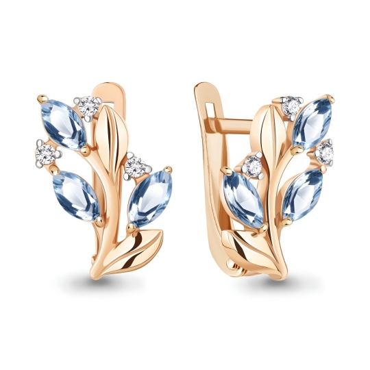 Кольцо из серебра с позолотой, топазами Swiss и фианитами