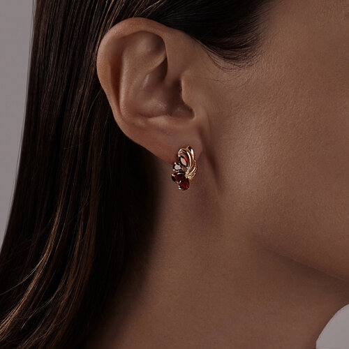 Кольцо из золота с гранатами