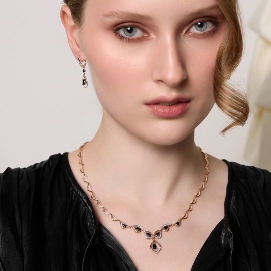 Серьги из золота с бриллиантами и сапфирами