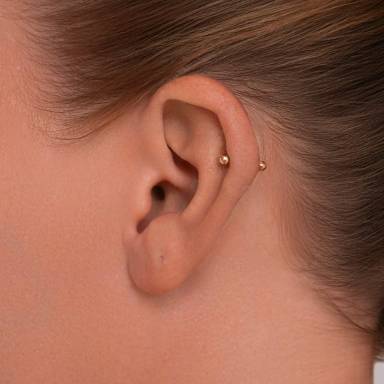 Пирсинг в нос из золота с бриллиантом